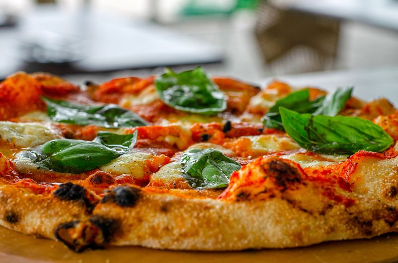 Signature Margherita jet's pizza with fresh basil